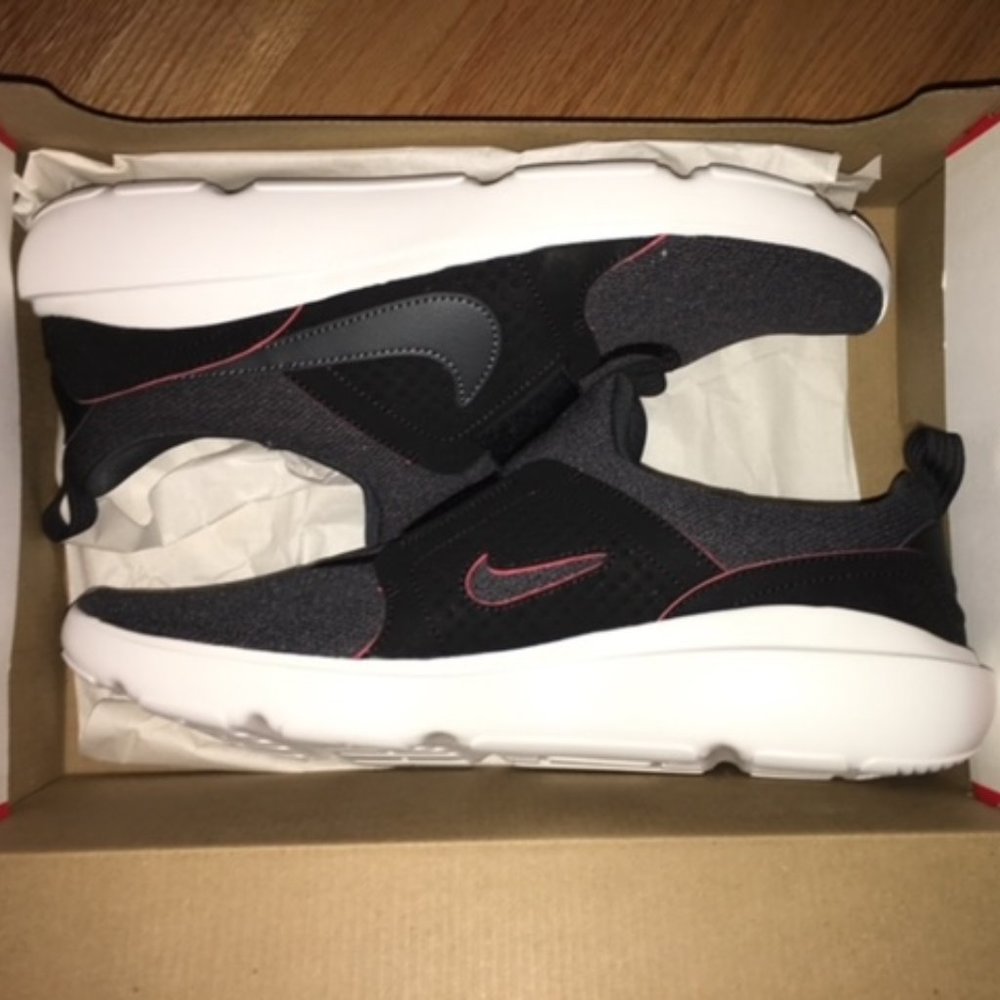 Nike men's slip on shoes, size 11. Brand new in box- never worn